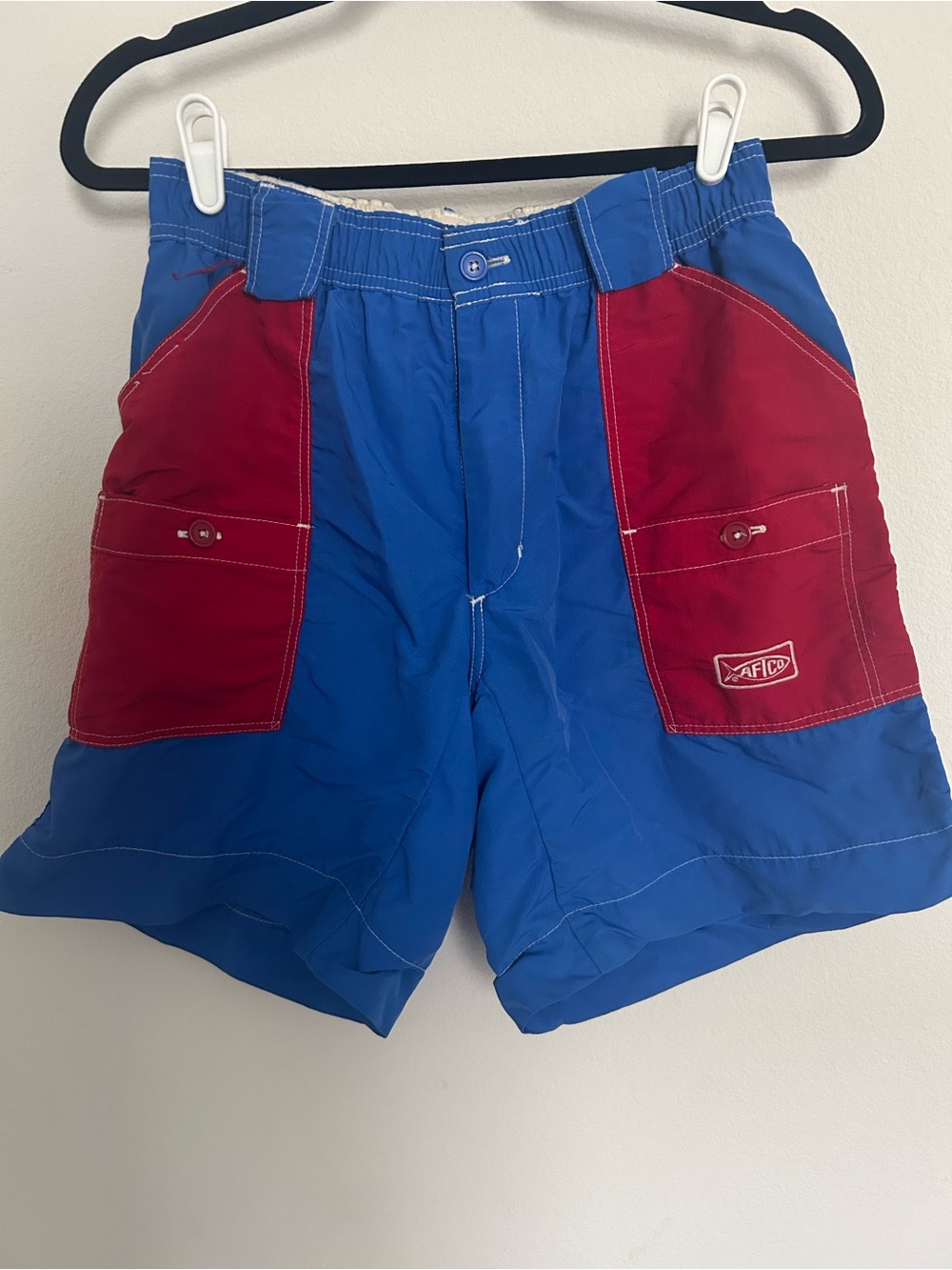 AFTCO Blue Swim Trunks with Red Front Pockets Size 30
